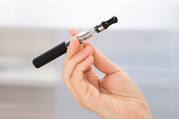 Person Hand With Electronic Cigarette