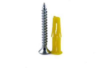 Screws and yellow plastic anchor