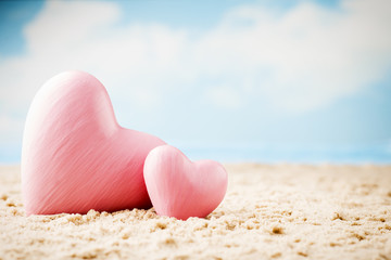 Heart on the sand on the seashore.