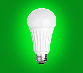 LED Light Bulb on green background