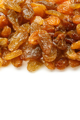 Yellow sultanas raisins isolated on white background cutout