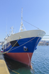 Naklejka premium old fishing trawler on the dock