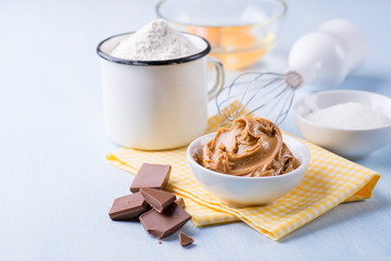 Peanut butter, chocolate chunks, eggs, sugar and cup of flour