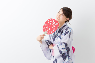 浴衣を着た女性　うちわ