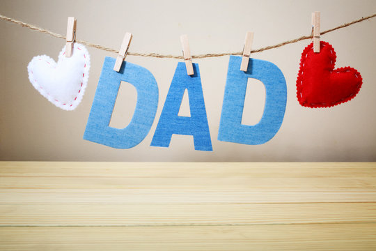 DAD Text And Felt Hearts Hanging On A String