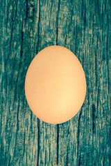 Egg on wooden background