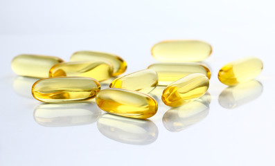 Capsules of fish oil, Omega 3 on gray background
