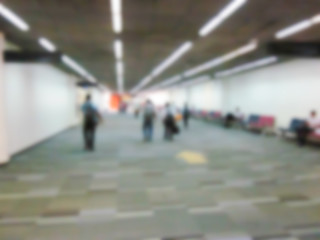 blurry defocused people in airport