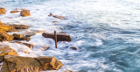 Wave and rocks