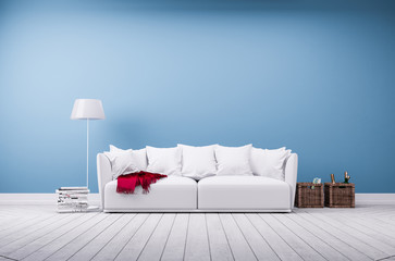 Couch und Stehlampe vor blauer Betonwand - obrazy, fototapety, plakaty