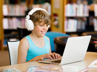 Boy spending time with notebook