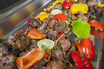 Beef tandoori kebab meat at an indian restaurant buffet