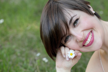 Outdoor portrait of smiling woman