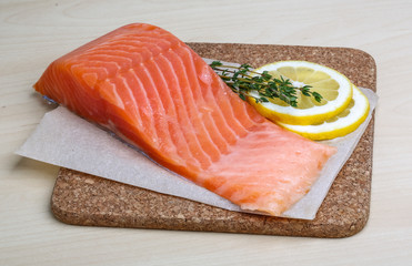 Salted Salmon on the wood background