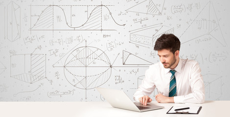 Businessman with business calculations background