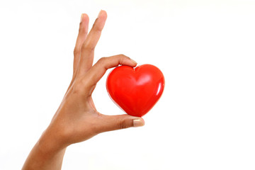 Obraz premium Hand holding red heart shape