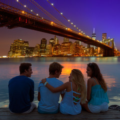 Friends group rear view at sunset fun New York