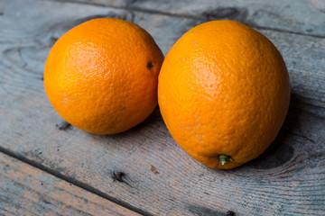 Orange on old wood background