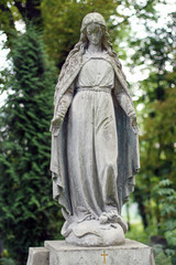 Old statue on grave in the Lychakivskyj cemetery of Lviv, Ukrain