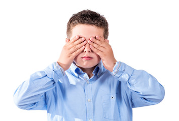 child covering his eyes