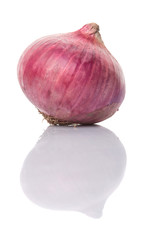 Large red onion over white background