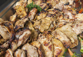 Grilled chicken at an oriental restaurant buffet