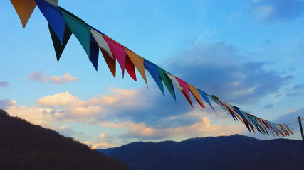 Colorful flags on the sky