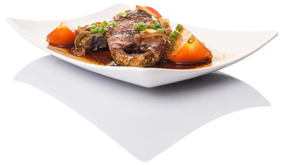 Malaysian dish deep fried mackerel tuna fish with soy sauce
