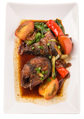 Malaysian dish deep fried mackerel tuna fish with soy sauce