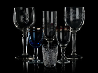 Glass glasses on the black