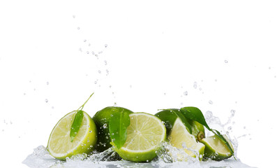 Limes with water splashes on white background