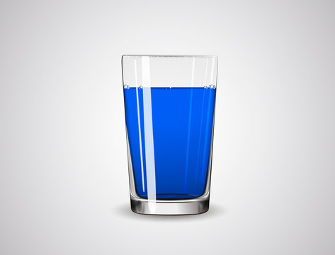 Glass full of blue liquid / juice