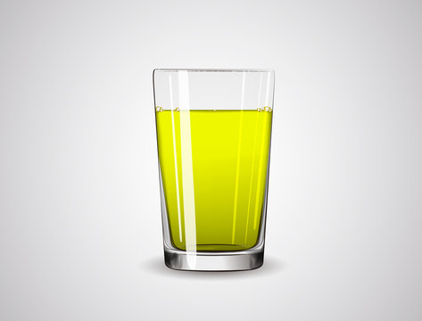 Glass full of yellow liquid / juice