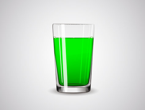Glass full of green liquid / juice
