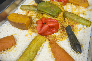 Vegetables on a bed of couscous at an oriental buffet