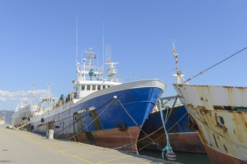 Naklejka premium old fishing trawler on the dock