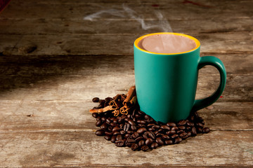 cup of black coffee over grunge wood