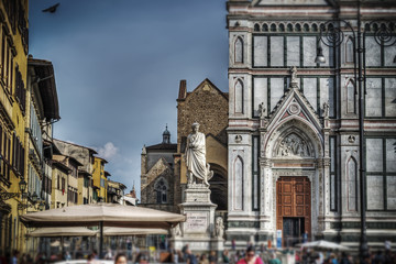 Alighieri statue and Santa Croce cathedral in Florence in tilt s