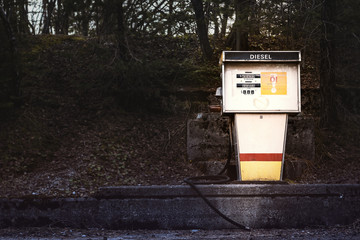 old gasoline pump for diesel on concrete platform