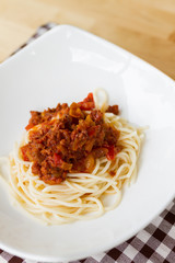 spaghetti bolognese on white dish