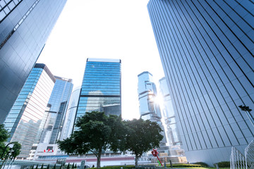 Obraz premium low angle view of skyscrapers and sunshine