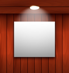 Empty frame on wooden wall lamp illuminated