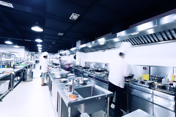 modern hotel kitchen and busy chefs.