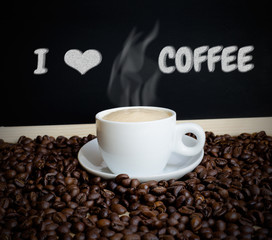 Coffee and coffee beans with chalk board