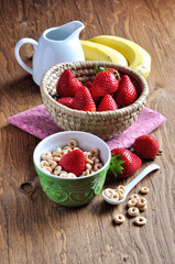 Cereal with strawberries for breakfast
