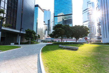 empty pavement and skyscrapers in modern city