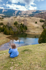 Woman looking at a beautiful landscape in the Catalan Pyrenees