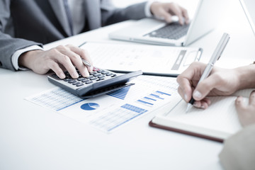 Business people discussing the charts and graphs showing the res