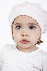 Rostro de ni&ntilde;a peque&ntilde;a con gorro