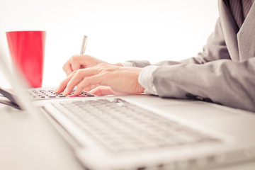 Businessman analyzing investment charts with laptop. Accounting